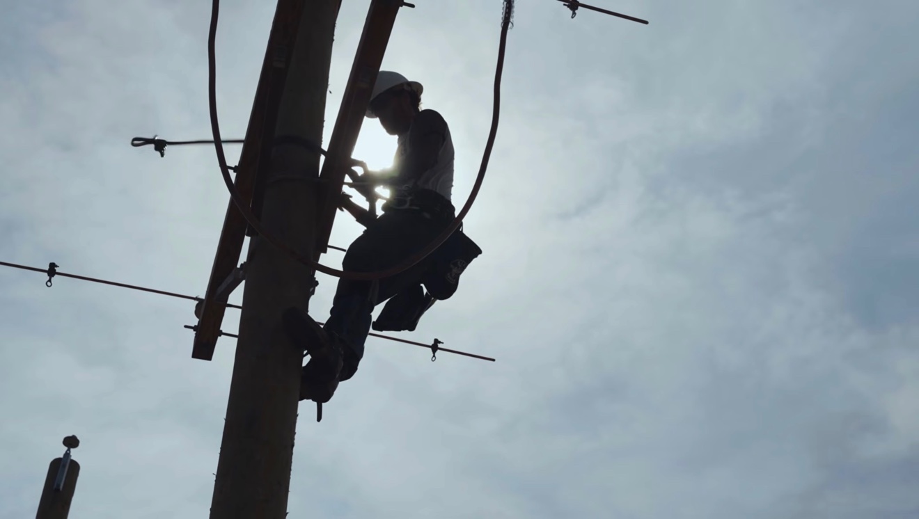 Appendix Media at work — lineman on a pole, from the Bolton Holdings film